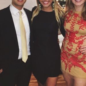 Asymmetrical quarter length sleeve dress